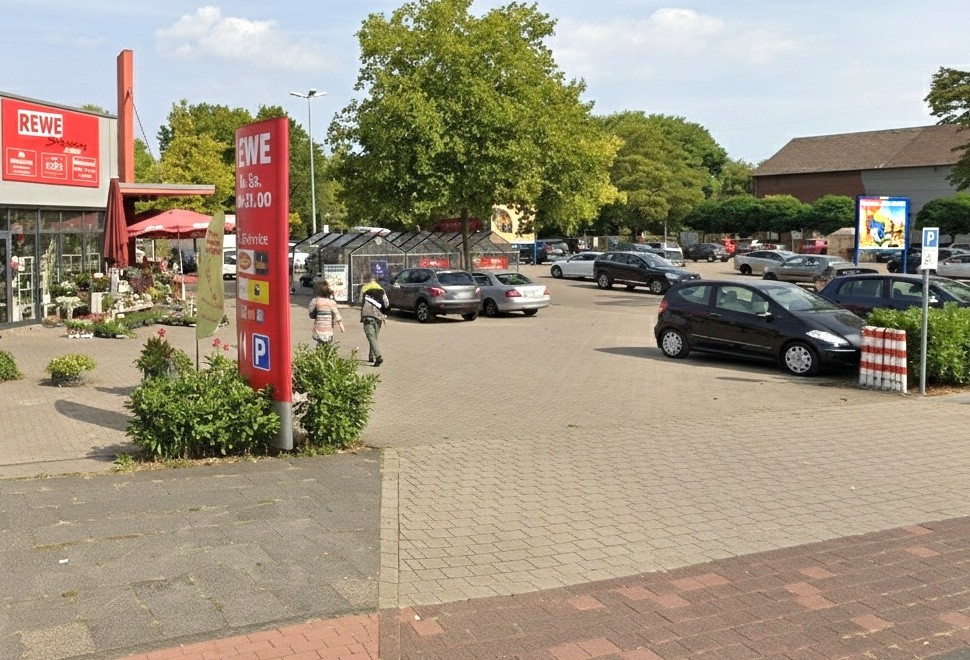 Mündelheimer Str. 132 /Rewe/geg. Einf/rts -Si Einfahrt